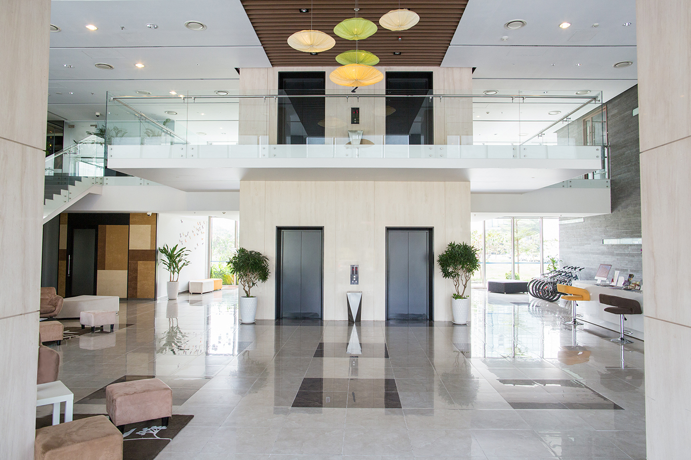 Empty lobby of condominium building. Elevators in hall of modern business center. Stylish interior design concept